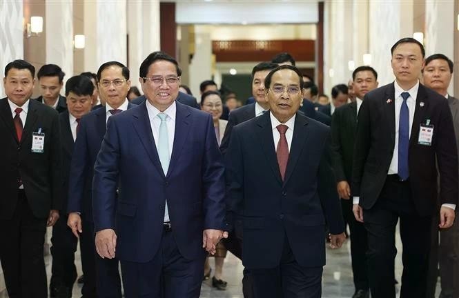 Prime Minister Pham Minh Chinh meets with Bounthong Chitmany, Permanent member of the Lao People’s Revolutionary Party (LPRP) Central Committee’s Secretariat and State Vice President of Laos in Vientiane on January 10. (Photo: VNA) img-6178.jpg