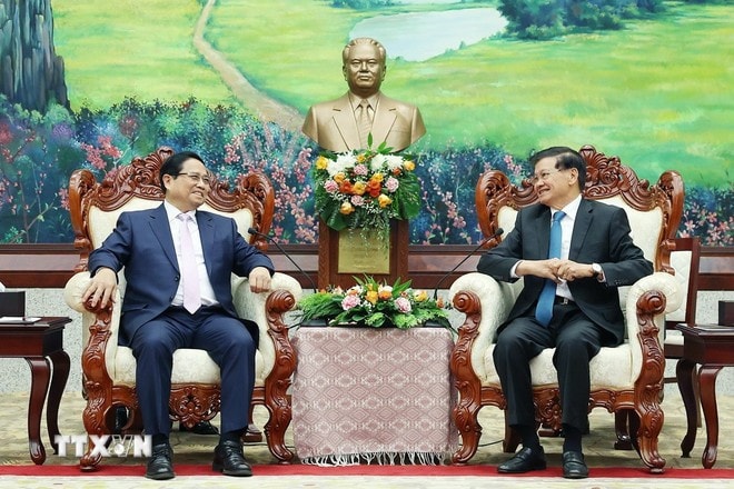 Thủ tướng Phạm Minh Chính hội kiến Tổng Bí thư, Chủ tịch nước Lào Thongloun Sisoulith. Ảnh: Dương Giang/TTXVN