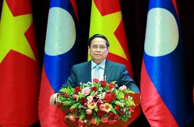 Prime Minister Pham Minh Chinh speaks at the investment cooperation conference in Vientiane on January 9. (Photo: VNA) 99b3bab9-ede9-414e-ad69-6f70e2470fb3.jpg