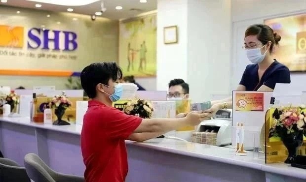 The State Bank of Vietnam set the daily reference exchange rate for the US dollar at 24,341 VND/USD on January 17 (Photo: VNA) exchange-rate-6759.jpg