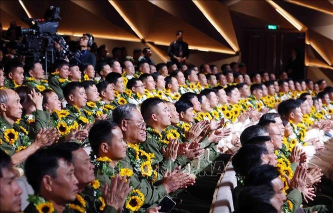Các đại biểu dự chương trình. Ảnh: Phạm Kiên/TTXVN
