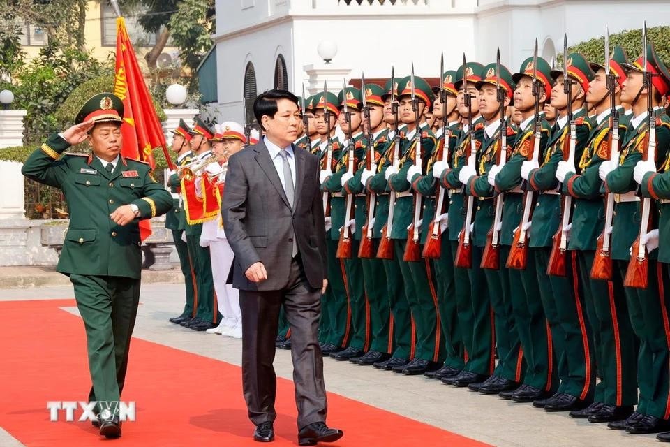 Chủ tịch nước Lương Cường duyệt đội danh dự. Ảnh: Lâm Khánh/TTXVN