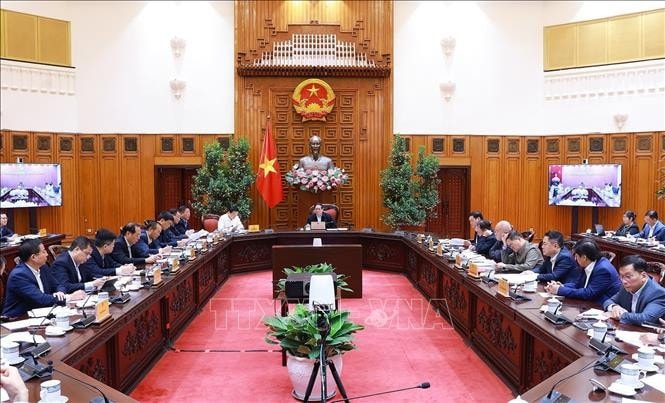 Thủ tướng Phạm Minh Chính chủ trì cuộc họp đẩy nhanh tiến độ dự án Cảng hàng không quốc tế Long Thành. Ảnh: Dương Giang/TTXVN
