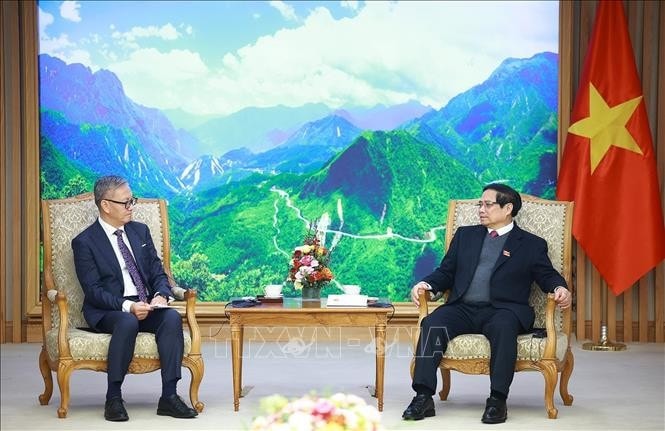 Thủ tướng Phạm Minh Chính tiếp Bộ trưởng Ngoại giao Lào Thongsavanh Phomvihane. Ảnh: Dương Giang/TTXVN
