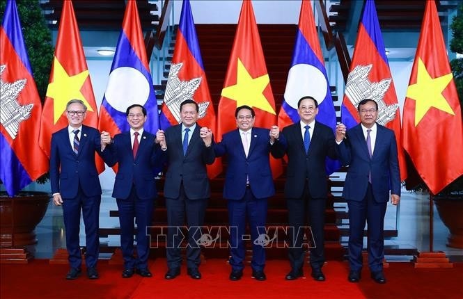 Thủ tướng Phạm Minh Chính, Thủ tướng Lào Sonexay Siphandone, Thủ tướng Vương quốc Campuchia Hun Manet và các thành viên. Ảnh: Dương Giang/TTXVN