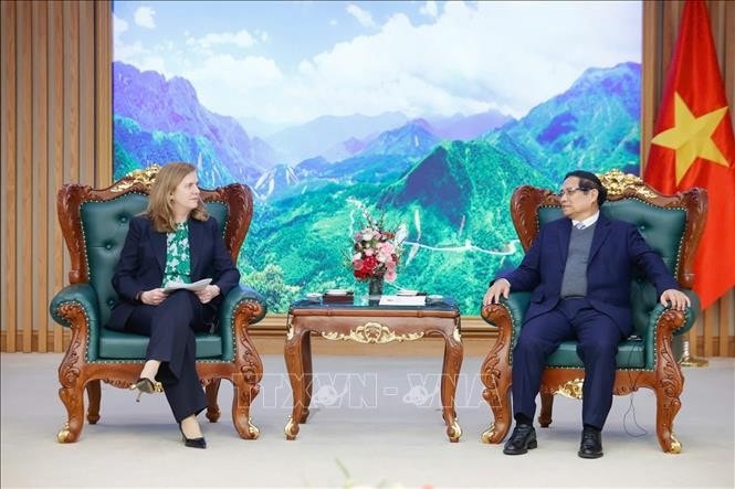 Thủ tướng Phạm Minh Chính tiếp bà Lynn Maxwell, Giám đốc Thương mại toàn cầu của S&P Global Ratings. Ảnh: Dương Giang/TTXVN