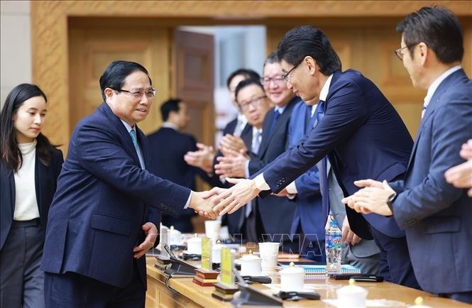 Thủ tướng Phạm Minh Chính với các doanh nghiệp Nhật Bản. Ảnh: Dương Giang/TTXVN