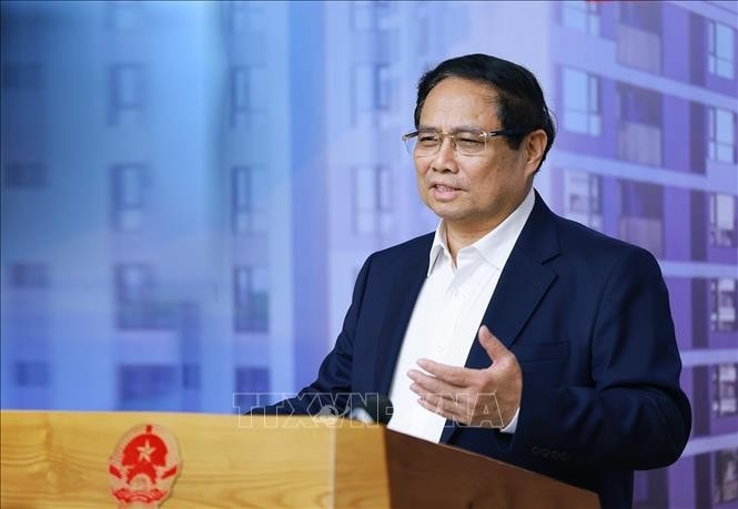 Thủ tướng Phạm Minh Chính chủ trì hội nghị thúc đẩy phát triển nhà ở xã hội. Ảnh: Dương Giang/TTXVN