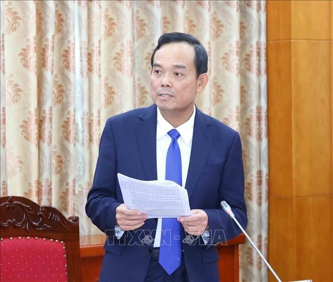 Bí thư Trung ương Đảng, Trưởng Ban Chính sách, chiến lược Trung ương Trần Lưu Quang trình bày báo cáo. Ảnh: Phương Hoa/TTXVN