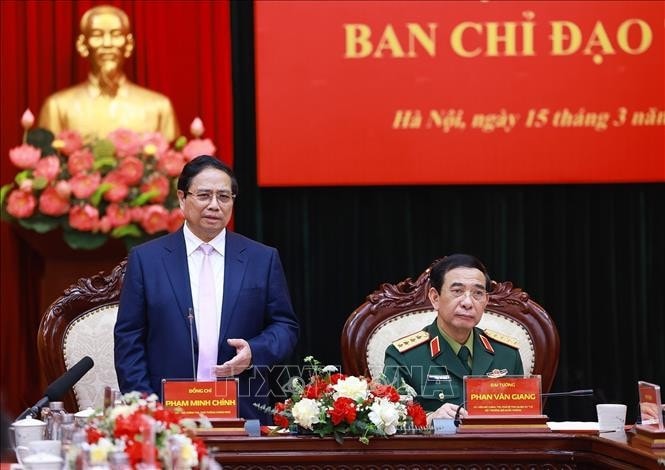 Thủ tướng Phạm Minh Chính làm việc với Tập đoàn Công nghiệp - Viễn thông Quân đội (Viettel). Ảnh: Dương Giang/TTXVN