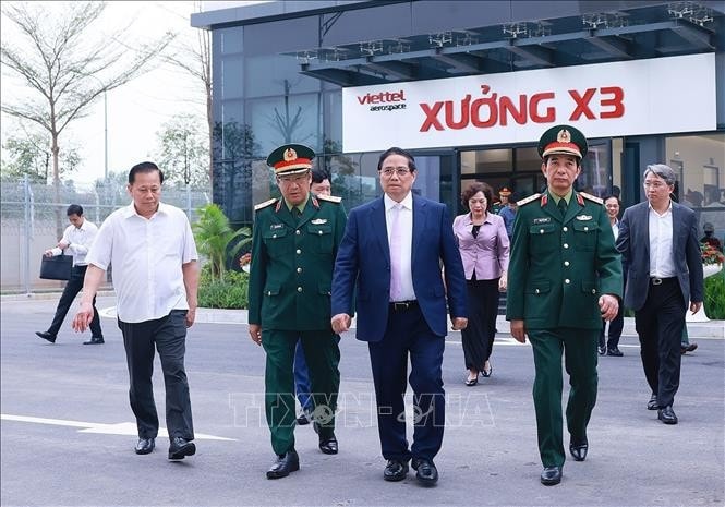 Thủ tướng Phạm Minh Chính thăm và làm việc với Tập đoàn Công nghiệp - Viễn thông Quân đội (Viettel). Ảnh: Dương Giang/TTXVN