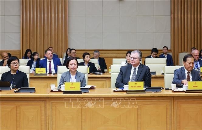 Thành viên đoàn doanh nghiệp Hội đồng Kinh doanh Hoa Kỳ - ASEAN tại buổi tiếp. Ảnh: Dương Giang/TTXVN