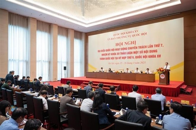 At the 7th meeting of full-time deputies. (Photo: VNA) At the 7th meeting of full-time deputies. (Photo: VNA)