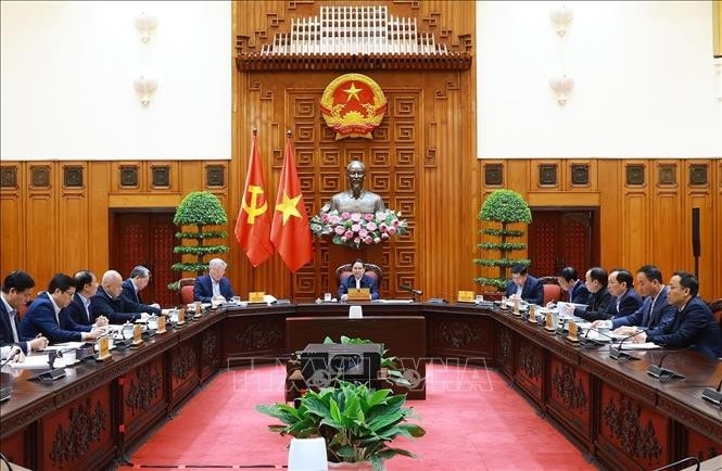 Thủ tướng Phạm Minh Chính chủ trì cuộc họp với các bộ, ngành để tháo gỡ khó khăn, vướng mắc các dự án. Ảnh: Dương Giang/TTXVN