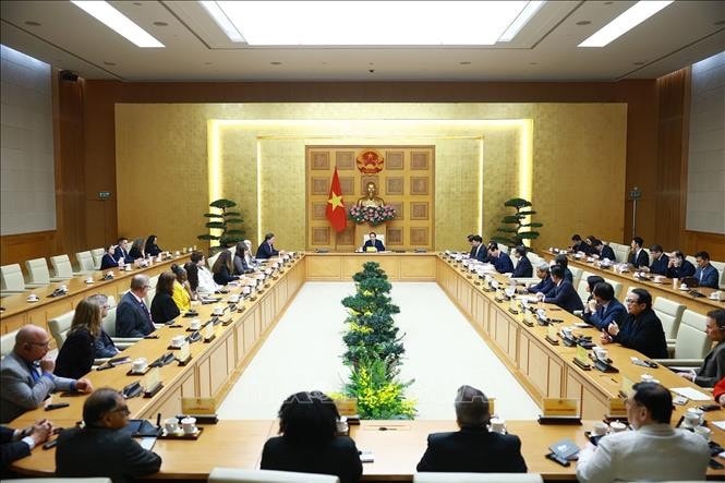 Thủ tướng Phạm Minh Chính tiếp lãnh đạo các trường đại học của Hoa Kỳ. Ảnh: Dương Giang/TTXVN