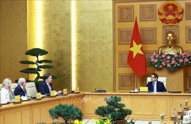 Thủ tướng Phạm Minh Chính tiếp lãnh đạo các trường đại học của Hoa Kỳ. Ảnh: Dương Giang/TTXVN