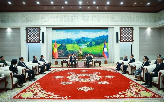 Thủ tướng Phạm Minh Chính gặp Tổng Bí thư, Chủ tịch nước CHDCND Lào Thongloun Sisoulith. Ảnh: Dương Giang/TTXVN