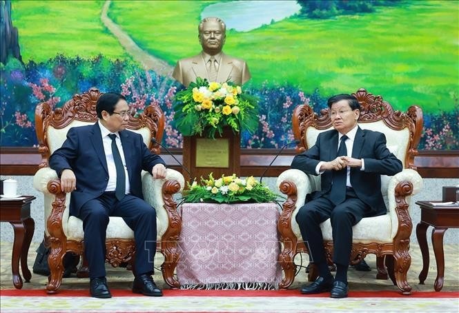 Thủ tướng Phạm Minh Chính gặp Tổng Bí thư, Chủ tịch nước CHDCND Lào Thongloun Sisoulith. Ảnh: Dương Giang/TTXVN