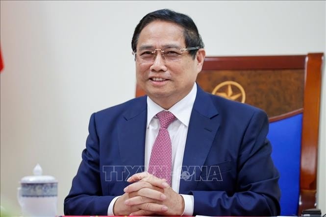 Thủ tướng Phạm Minh Chính điện đàm với Thủ tướng Malaysia Anwar Ibrahim. Ảnh: Dương Giang/TTXVN