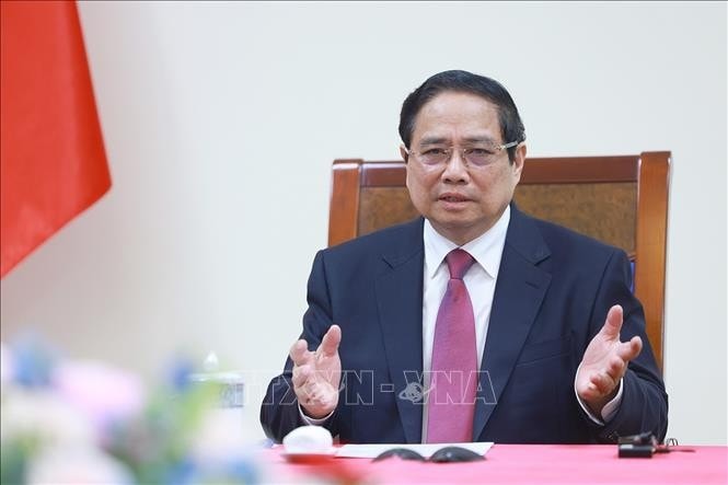 Thủ tướng Phạm Minh Chính điện đàm với Thủ tướng New Zealand Christopher Luxon. Ảnh: Dương Giang/TTXVN