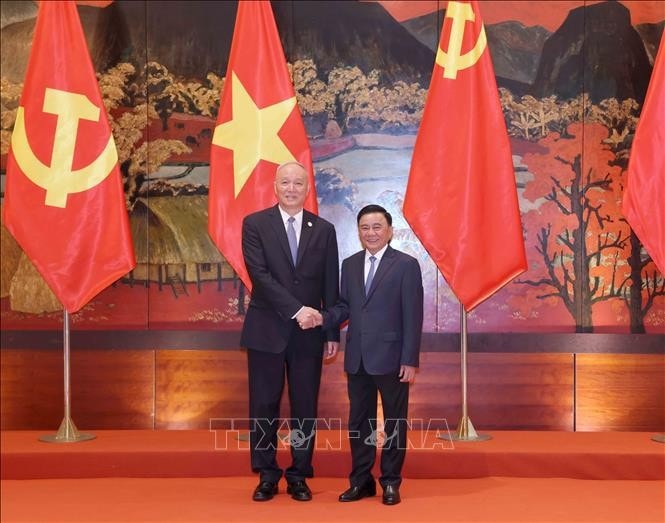 Ủy viên Bộ Chính trị, Thường trực Ban Bí thư Trần Cẩm Tú và Ủy viên Thường vụ Bộ Chính trị, Bí thư Ban Bí thư, Chánh Văn phòng Trung ương Đảng Cộng sản Trung Quốc Thái Kỳ. Ảnh: Phương Hoa/TTXVN