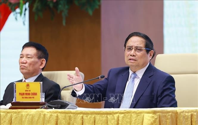 Thủ tướng Phạm Minh Chính chủ trì buổi làm việc. Ảnh: Dương Giang/TTXVN