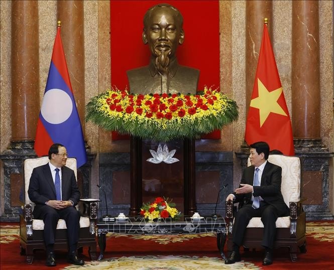 Chủ tịch nước Lương Cường tiếp Thủ tướng Lào Sonexay Siphandone. Ảnh: Lâm Khánh/TTXVN