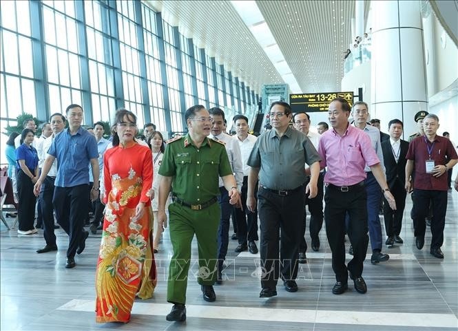 Thủ tướng Phạm Minh Chính thăm công trình Nhà ga T3 Cảng hàng không quốc tế Tân Sơn Nhất. Ảnh: Dương Giang/TTXVN