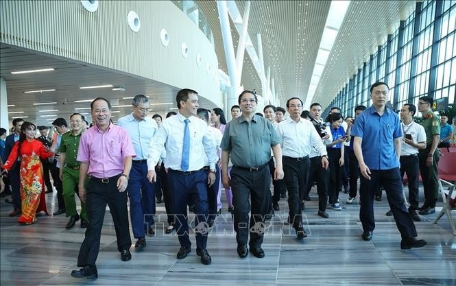 Thủ tướng Phạm Minh Chính thăm công trình Nhà ga T3 Cảng hàng không quốc tế Tân Sơn Nhất. Ảnh: Dương Giang/TTXVN