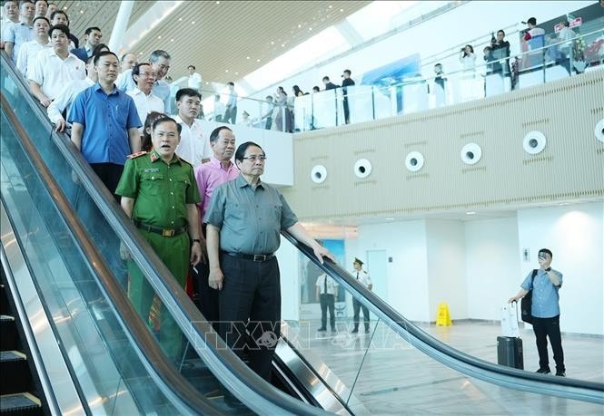 Thủ tướng Phạm Minh Chính thăm công trình Nhà ga T3 Cảng hàng không quốc tế Tân Sơn Nhất. Ảnh: Dương Giang/TTXVN