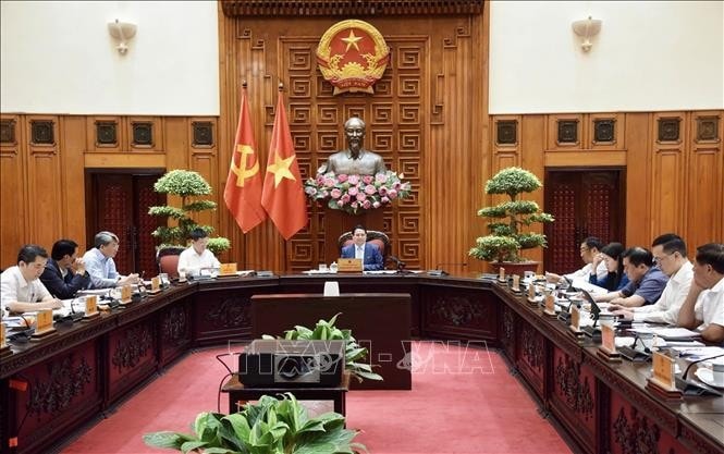 Thủ tướng Phạm Minh Chính chủ trì họp Thường trực Chính phủ chuẩn bị đàm phán thương mại với Hoa Kỳ. Ảnh: Dương Giang/TTXVN