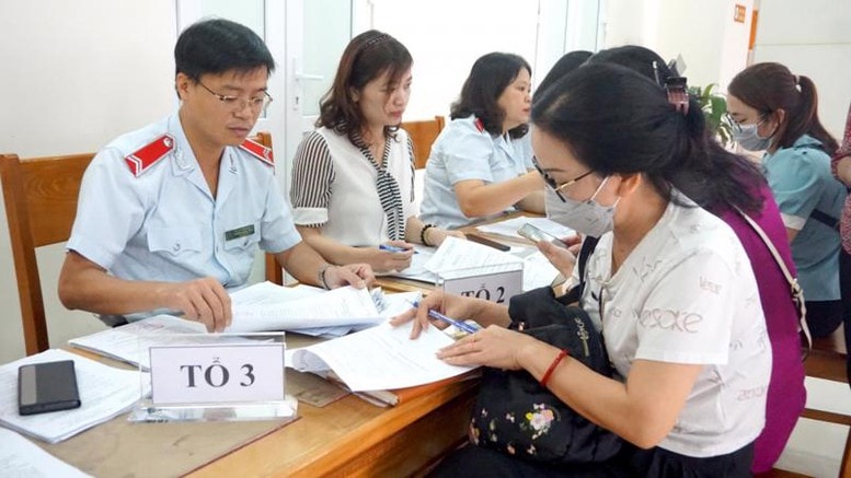 Các cơ quan liên quan đã có nhiều cố gắng, thực hiện nhiều giải pháp nhằm hạn chế tình trạng chậm đóng, trốn đóng bảo hiểm xã hội, bảo hiểm thất nghiệp. Ảnh VGP