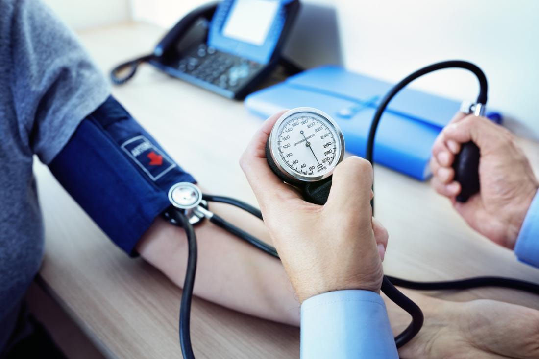 a-doctor-measuring-a-patients-blood-pressure-15998981164661929566121.jpg