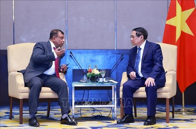 PM Pham Minh Chinh meets with Tony Fernandes, Founder and CEO of Capital A, in Kuala Lumpur on May 25 (Photo: VNA) captial-a.jpg
