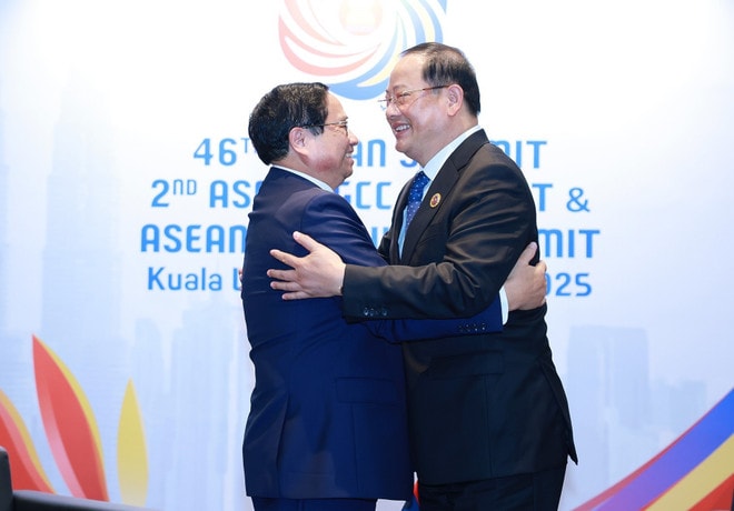 Vietnam and Laos have enjoyed close fraternal relations. (Photo: VNA) vna-potal-thu-tuong-pham-minh-chinh-gap-thu-tuong-lao-sonexay-siphandone-tai-hoi-nghi-cap-cao-asean-lan-thu-46-8055606.jpg