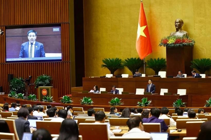 Minister of Finance Nguyen Van Thang speaks at a discussion session of the NA. (Photo:V NA)