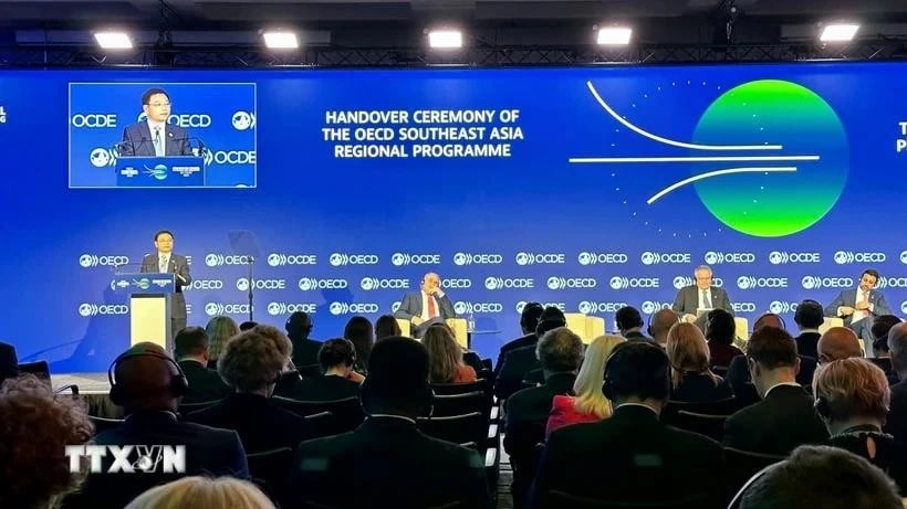 Finance Minister Nguyen Van Thang addresses the OECD leadership hand-over ceremony at the OECD Ministerial Council Meeting (MCM) 2025. (Photo: VNA)
