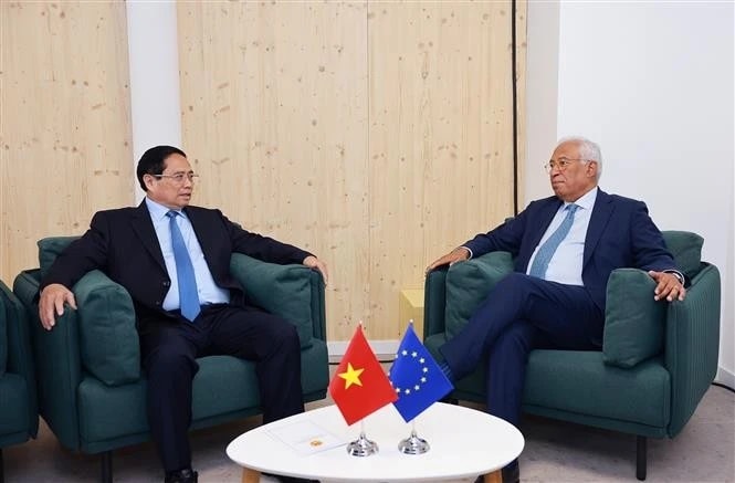 Prime Minister Pham Minh Chinh (L) meets with President of the European Council Antonio Costa (Photo: VNA)
