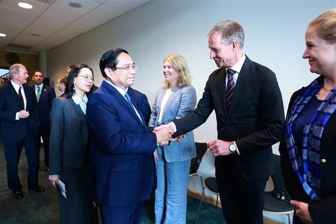 Prime Minister Pham Minh Chinh meets with representatives from major Swedish corporations. Photo: VNA vna-potal-thu-tuong-lam-viec-voi-mot-so-tap-doan-hang-dau-thuy-dien-8087766.jpg