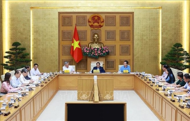 Participants at the meeting. (Photo: VNA) hanh-tuu-cua-dat-nuoc-nhan-dip-ky-niem-80-nam-quoc-khanh-stand.jpg
