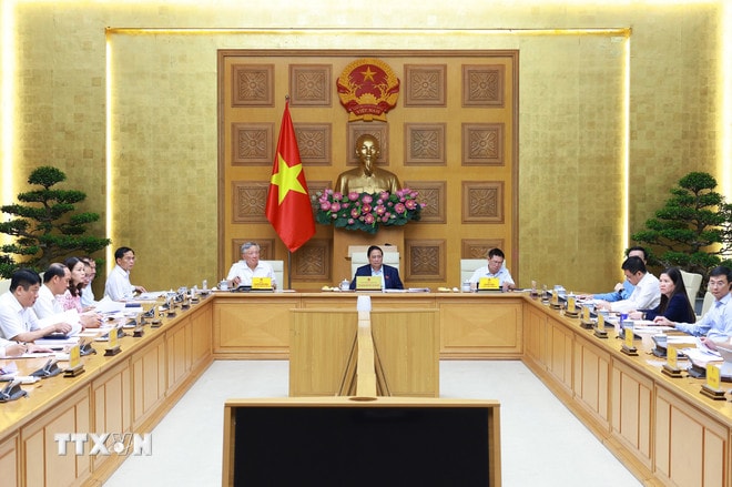 Thủ tướng Phạm Minh Chính chủ trì họp đánh giá tác động của các cuộc xung đột trên thế giới ảnh hưởng đến tình hình kinh tế-xã hội trong nước. (Ảnh: Dương Giang/TTXVN) ttxvn-thuong-truc-chinh-phu-hop-danh-gia-tac-dong-cua-cac-cuoc-xung-dot-tren-the-gioi-den-tinh-hinh-kinh-te-xa-hoi-23-3.jpg