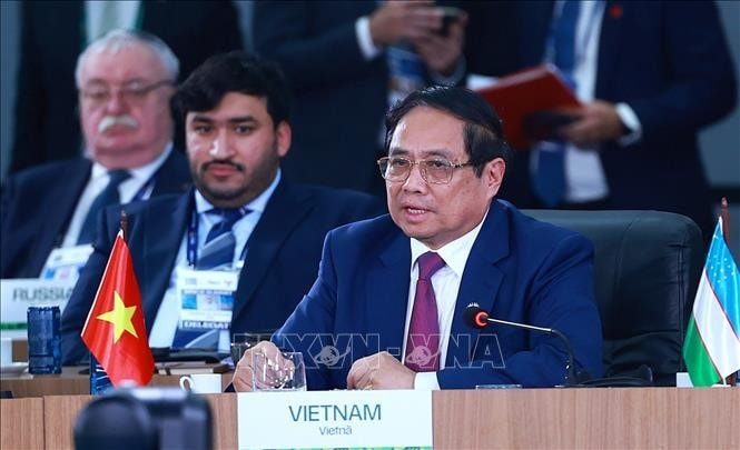Prime Minister Pham Minh Chinh delivers his remarks at the high-level discussion on “Strengthening Multilateralism, Economic–Financial Issues, and Artificial Intelligence” at the expanded BRICS summit 2025. (Photo: VNA)
