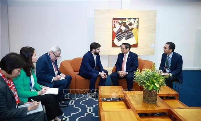 At the meeting between Vietnamese Prime Minister Pham Minh Chinh and Chilean President Gabriel Boric Font in Rio de Janeiro on July 7 (Photo: VNA) uuidfd5a1ca8-d9b3-4bfb-b1bf-4698b5b23f14code001library1type1mode1loctruecaptrue.jpg