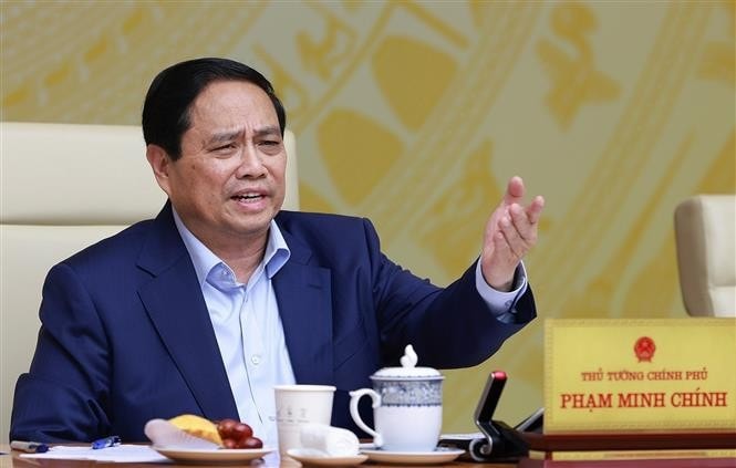 Prime Minister Pham Minh Chinh at the national online conference on July 16. (Photo: VNA)
