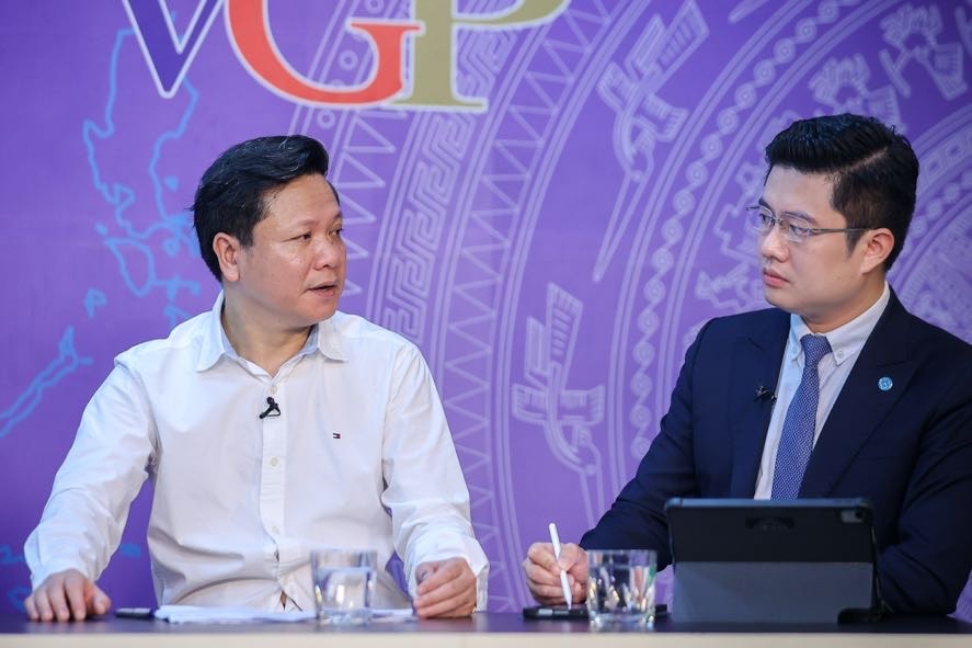 Vụ trưởng Vụ chính quyền địa phương (Bộ Nội vụ) Phan Trung Tuấn thông tin về kết quả 3 tuần vận hành mô hình chính quyền địa phương 2 cấp. Ảnh: Nhật Bắc