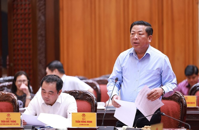 Minister of Construction Tran Hong Minh speaks at the event (Photo: VNA) vna-potal-thu-tuong-chu-tri-cuoc-hop-ve-trien-khai-chien-dich-xay-dung-truong-hoc-cho-cac-xa-bien-gioi-8175077.jpg