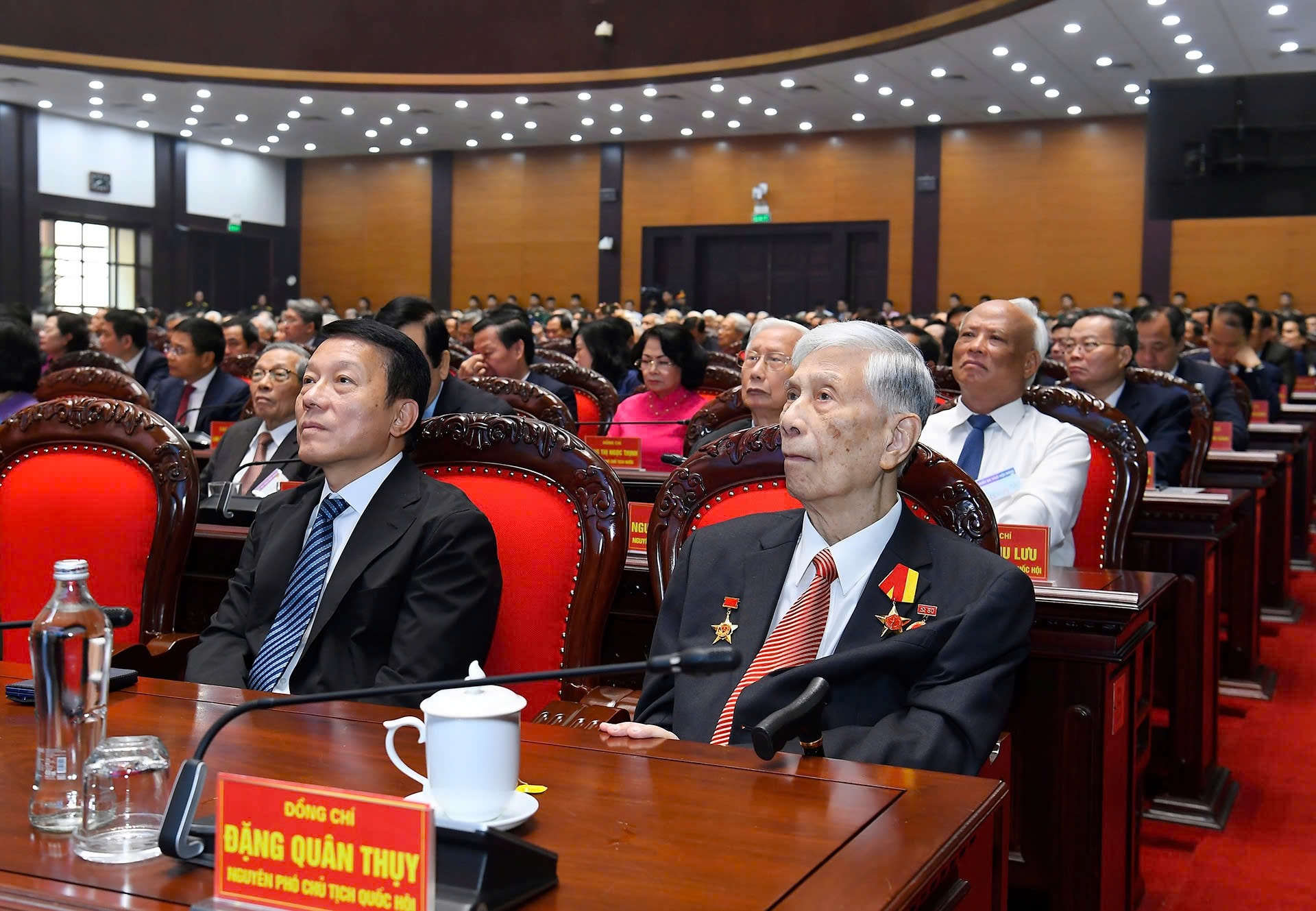Ủy viên Bộ Chính trị, Bộ trưởng Bộ Công an, Đại tướng Lương Tam Quang; nguyên Phó Chủ tịch Quốc hội Đặng Quân Thụy và các đại biểu tham dự cuộc gặp mặt. Ảnh: Tuấn Huy