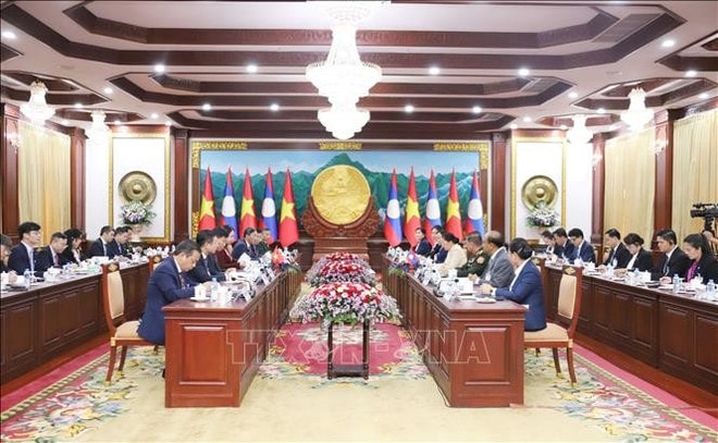 At the talks between State Vice President Vo Thi Anh Xuan and her Lao counterpart Pany Yathotou. (Photo: VNA) hoi-dam.jpg