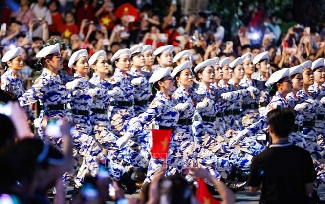 Military medical formation passes Nguyen Thai Hoc Street during the rehearsal in Hanoi on August 21. (Photo: VNA) 