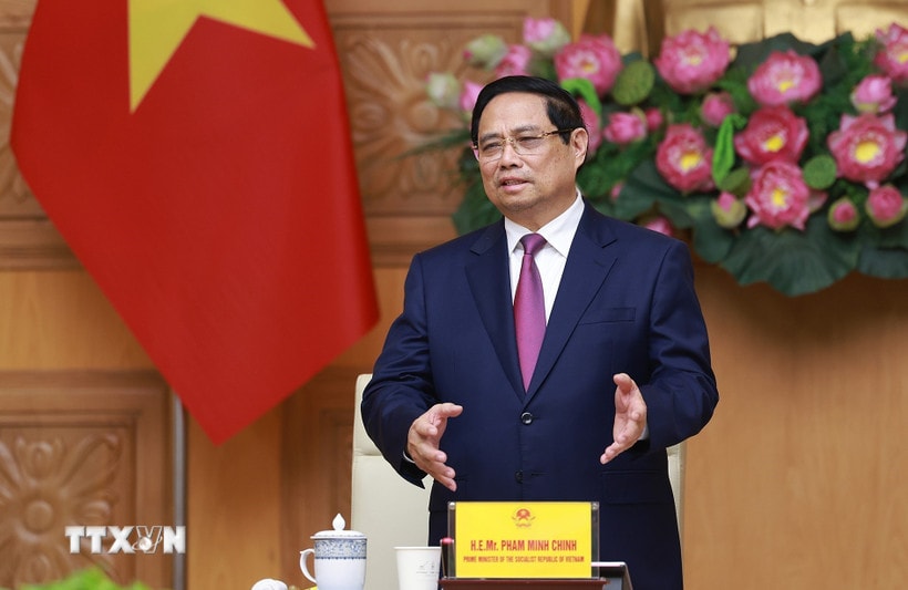 Thủ tướng Phạm Minh Chính tiếp đoàn lãnh đạo doanh nghiệp bán dẫn quốc tế. (Ảnh: Dương Giang/TTXVN)